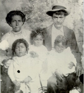 Fig. 1. Richard Pompey, his wife Libbie (Olivia) Gilbert, and their children: Harold, Corrine, and Casper, about 1910. Richard, born in Whitley County, Indiana, in 1875, was the son of Zachariah Pompey and Nancy Rickman (sister of William H. Rickman, shown below). Zachariah was the son of Fielding Pompey, born about 1801, who married Lavina Jeffries, daughter of Herbert Jeffries of Brunwick County, Virginia. Libbie Gilbert was the daughter of a white woman and an African American man. Photograph courtesy of Tom Kavalak Jr.