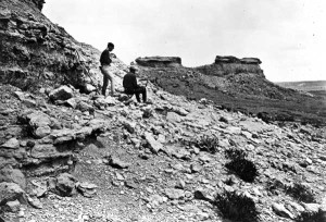 "Gifford painting a landscape of castellated rocks near Chugwater Creek." Guessing from the hat, the man standing is Ford, the mineralogist. (These are the same rocks in the Gifford oil sketch owned by the Amon Carter Museum in Fort Worth.) W. H. Jackson photo, courtesy of the USGS archives.