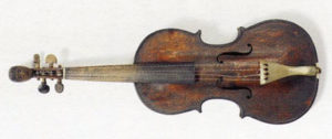 Fig. 2. Fiddle, Eliphalet Grover, pine, maple, and walnut wood, bone, horn, catgut strings, 25 ½ x 8 x 1 7/10 in. (Boon Island, Maine, 1821). Courtesy of the Museums of Old York, York, Maine.