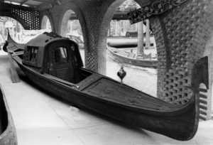 Figure 1. The Moran family’s gondola installed in the Mariners’ Museum courtyard, c. 1950. In this view, the gondola’s felze is installed atop the boat. Photograph courtesy The Mariner’s Museum, Newport News, VA.