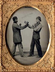Fig. 1. Photographer unknown: subjects unknown (boxers), quarter plate ambrotype, c. 1860-65. Collection of Greg French.
