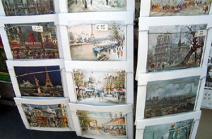 Fig. 5. Postcards showing views of Paris for sale streetside, 2003. Photo by the author. 