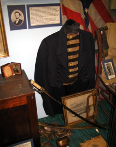 Fig. 3. John J. P. Blinn’s dress uniform, gilded sword, and epaulettes on display with his photo at the Vigo County Historical Society, Terre Haute, as photographed by the author in September 2004.