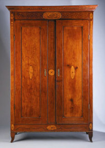 Fig. 11 Creole armoire, Louisiana (probably 1815), cherry with cypress; original brass fische hinges, 84 1/2 x 51 x 19 in. Courtesy of the Collection of Mr. and Mrs. Chester Mehurin, New Orleans. Click image for slideshow of details.