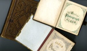 1. Three leather-bound albums from the A.S. Williams Collection at the University of Alabama. Courtesy of the W.S. Hoole Special Collections Library, the University of Alabama.