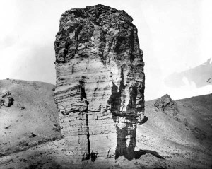 "A rock near Green River Station, Wyoming, 1869." Note the man at the bottom. Hayden the geologist was drawn to Jackson's unique respect for rocks. W. H. Jackson photo, courtesy of the USGS archives.