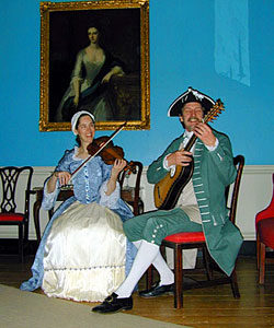 1. David and Ginger Hildebrand at the William Paca House in Annapolis, Maryland, c. 2004. A woman playing the violin contradicts the gender associations with instruments of the day, so we're always careful to point that out in concert. Photograph courtesy of David and Ginger Hildebrand.